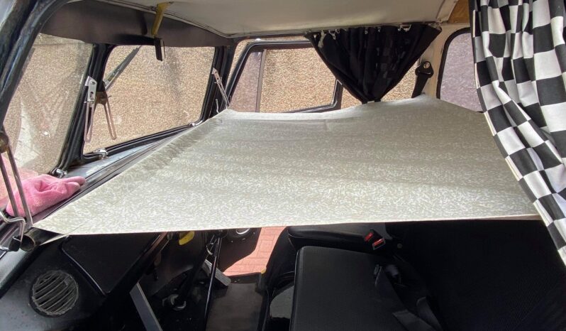 
								Volkswagen T2 with full split-screen conversion full									